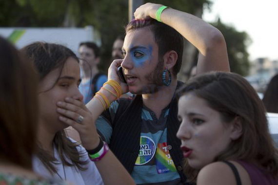 Участники гей-парада вскоре после нападения. 30 июля 2015