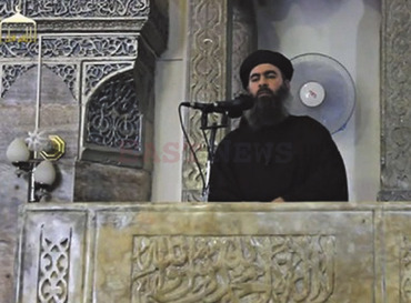 Абу-Бакр аль-Багдади —  самопровозглашенный лидер ИГ  Кадр из видеообращения Photoshot/REPORTER
